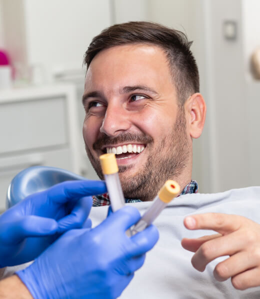 A patient choosing his form of sedation in the dental chair.