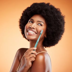 smiling with toothbrush